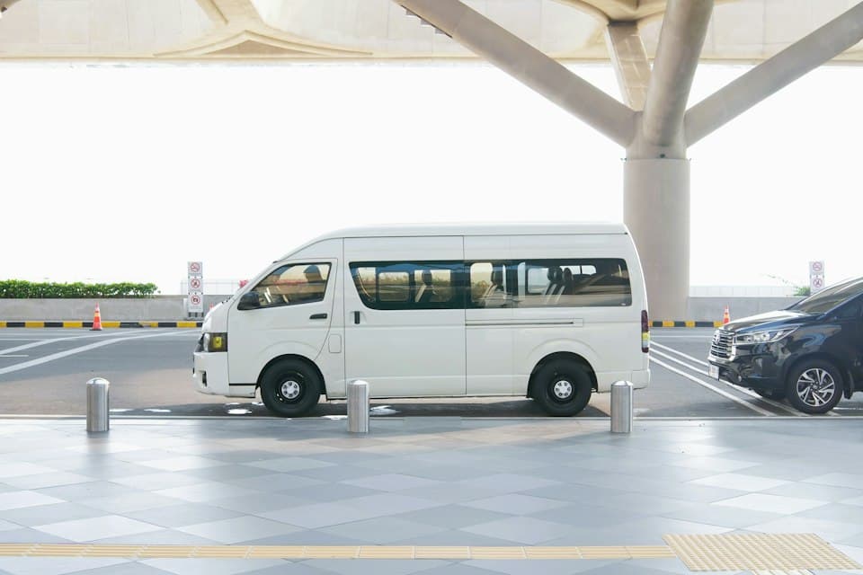 Transfer van at an airport terminal